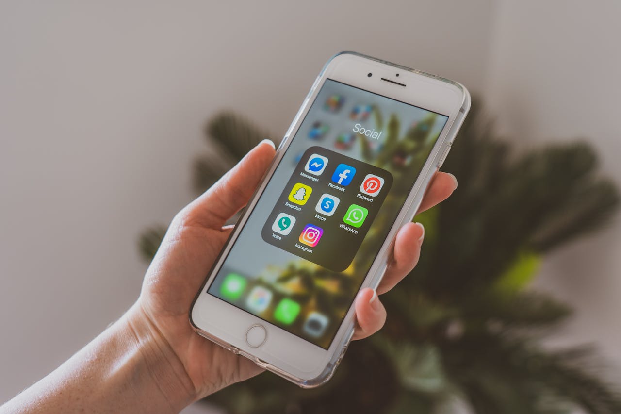 Phone With Social Media Apps (Source: Unsplash)